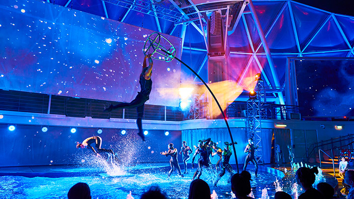 Awe at the exhilarating live onboard entertainment at the AquaTheater.