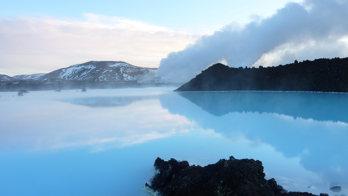 Relax in the warm waters of the Blue Lagoon in Iceland.