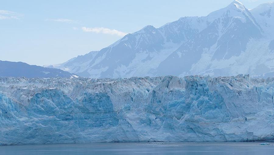A view from the water of Wrangell-St. Elias National Park and Preserve and it’s icy glaciers in Alaska near the gulf.