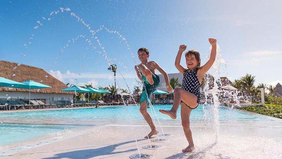 The perfect pool day awaits at the new Aguamarina Family Oasis, home to a snack & bar area, splash zone, and mini cabanas for the little ones.